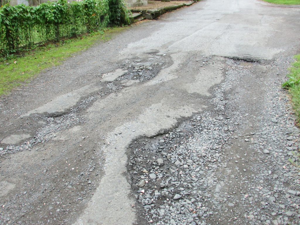 Road was filled with potholes and craters